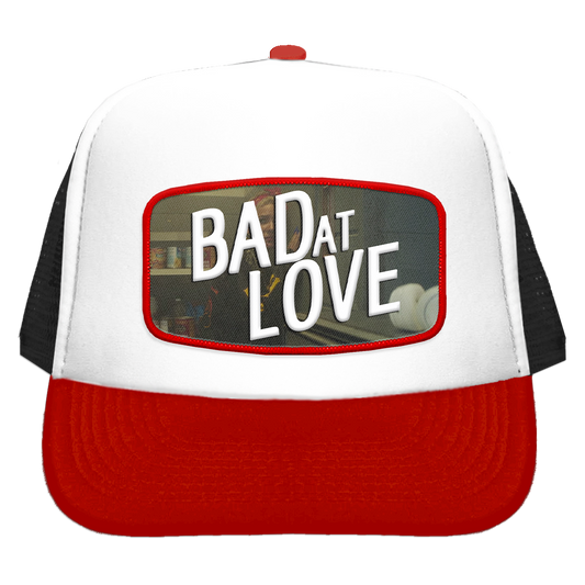 Bad at Love Trucker Cap